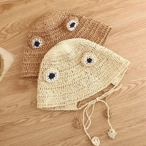 Handmade crochet frog straw sun hat for women with chin straps in khaki and beige tones