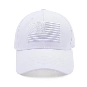 Detail of white cotton baseball cap featuring minimalist American flag 3D embroidery