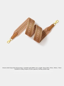 Adjustable 5cm wide woven bag strap with brown leather ends and gold metal clips