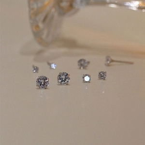 Minimalist round cubic zirconia stud earrings in various sizes with 925 silver needles