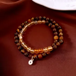Bracciale a doppio strato in occhio di tigre e perline di vetro con ciondolo