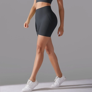 Detail view of high-waisted seamless yoga shorts showing the squat-proof fabric and fit