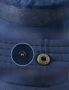 Detail of dark blue sun hat featuring breathable mesh design and vintage copper snap buttons