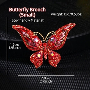 Vintage gold butterfly brooch with red crystals and AB diamonds, size 7.0cm x 4.9cm