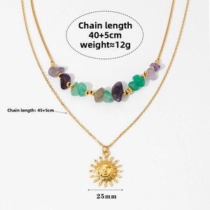 Detail of double-layer necklace with natural stone beads and golden sun face pendant