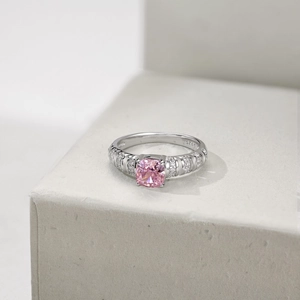 Macro detail of S925 sterling silver ring with ice cut pink diamond zircon