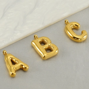 Golden puffy bubble letter A B C pendants in polished stainless steel for women