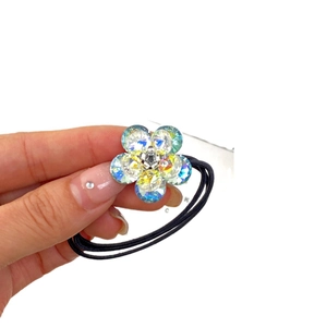 Elegant double-layered crystal flower hair tie with iridescent petals on black elastic