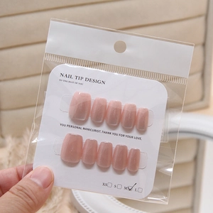 Short square light pink cat-eye press-on nails set in retail packaging size M