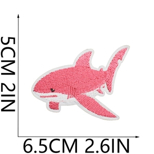 Pink shark embroidered patch detail showing 6.5x5cm dimensions for iron-on clothing
