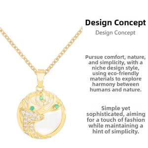 Detail of deer pendant with cat-eye stone, green gems and crystals on gold chain