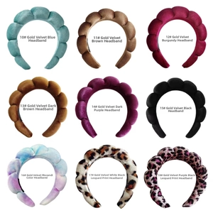 Close-up of velvet bubble headbands in multiple colors including leopard print and solid tones