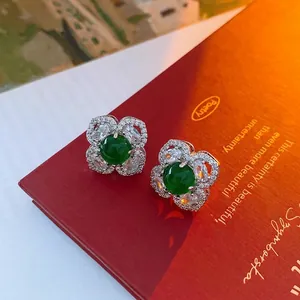 Vintage silver flower earrings with green zircon gems and micro-pave crystals