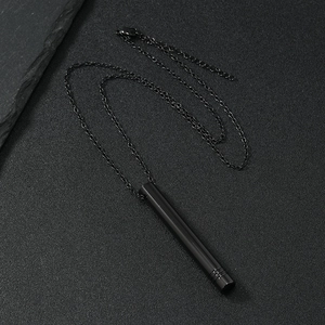Black mindfulness breathing whistle necklace in polished stainless steel for stress relief