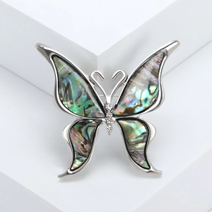 Elegant silver butterfly brooch with colorful abalone shell wings and zircon accents