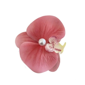 Elegant pink orchid hair clip with central pearl accent for women's side fringe styling