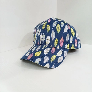 Dark blue baseball cap with colorful feather print pattern and curved brim for sun protection