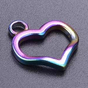Macro shot of iridescent heart pendant with hollow design for custom DIY necklaces
