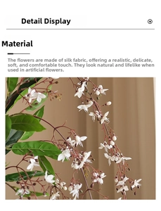 Detailed macro view of white silk jasmine petals and soft green leaves texture