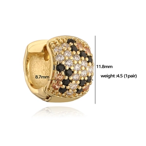 Detailed view of leopard pattern gold hoop earrings with dimensions 8.7mm by 11.8mm