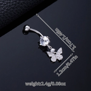 Macro view of butterfly navel ring with silver plating and clear cubic zirconia details