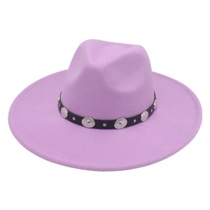 Detail of light purple wide brim fedora hat with black belt and silver metal conchos