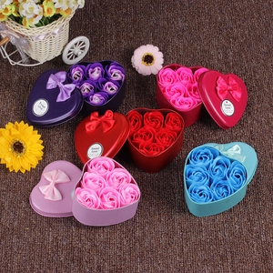 Heart-shaped gift box with six soap roses and decorative bow in multiple vibrant colors