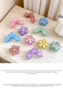 Detailed comparison of flower-shaped hair claws in varied sizes and candy colors