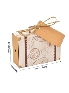 Close-up of vintage mini suitcase candy box with jute handle and retro Paris stamps