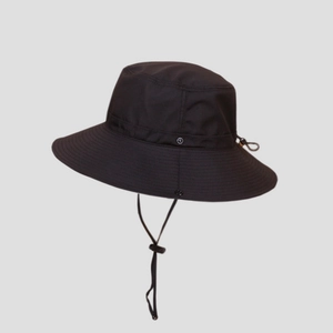 Detail of waterproof black sun hat featuring adjustable chin strap and drawstring toggle