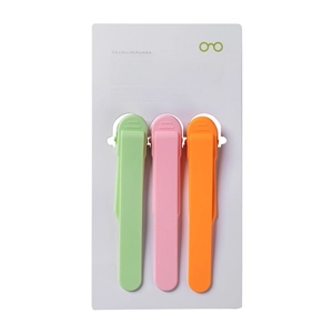 Set of three colorful silicone automatic page-following bookmarks in green pink and orange
