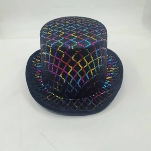 Close-up of black sequins on a magician top hat with a decorative diamond mesh pattern
