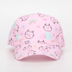 Detail of pink kids baseball cap featuring cartoon cat, rainbow and flower prints