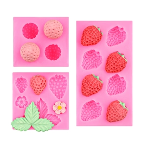 Pink silicone mold for realistic strawberries, raspberries, and leaf cake decorations