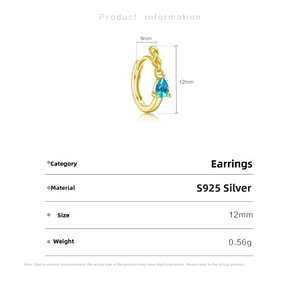 Detail view of gold-plated S925 silver hoop earring with a blue zircon water drop pendant