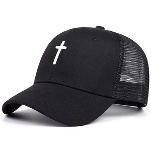 Retro black mesh trucker hat with white cross embroidery shown from a 45-degree angle