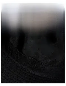 Macro detail of breathable wide sweatband inside the black cotton bucket sun hat