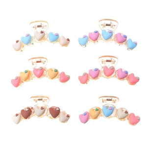 Set of 6 matte heart-shaped hair claw clips in assorted pastel macaron colors