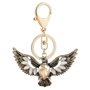 Golden eagle keychain with sparkling opal inlay and champagne gemstone pendant charm