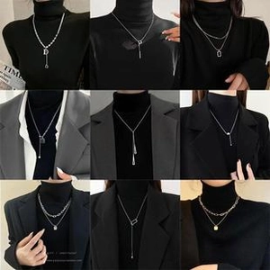 Detailed grid showing nine silver Cuban link and geometric necklaces on models