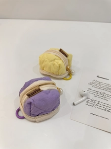 Quilted heart pattern earphone pouch in purple and yellow with pearl zipper