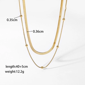 Double-layered gold snake chain necklace with round beads and product size details