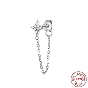 Detail of 925 sterling silver star stud earring with hanging tassel chain and zircon