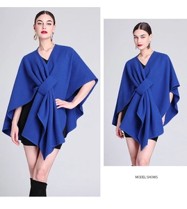 Detailed views of a blue knitted cape shawl with unique knot design for women