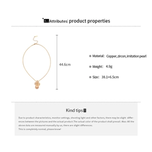 Detail showing dimensions and material of flower pearl necklace with zircon accents