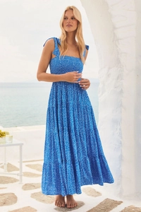 Detail of blue polka dot dress with elastic pleated bust and shoulder tie ribbons