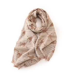 Fashion houndstooth plaid scarf in brown with elegant fringe details on white background
