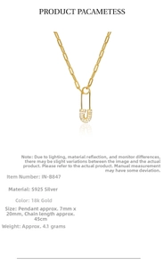 Detail of S925 silver safety pin necklace pendant with 18k gold plating and pave zircons