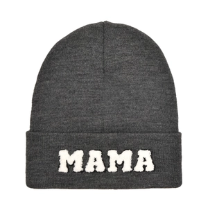 Detailed view of dark grey knit beanie featuring white fuzzy MAMA letter embroidery
