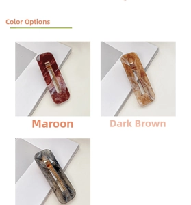 Close-up of rectangular acetate hair clips in brown and marble patterns with gold clips